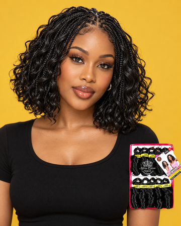 Woman wearing an airy French curl bob with tiny knotless braids and loose wavy curls